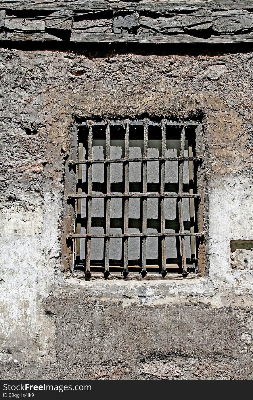 Window in wall of old house. Window in wall of old house