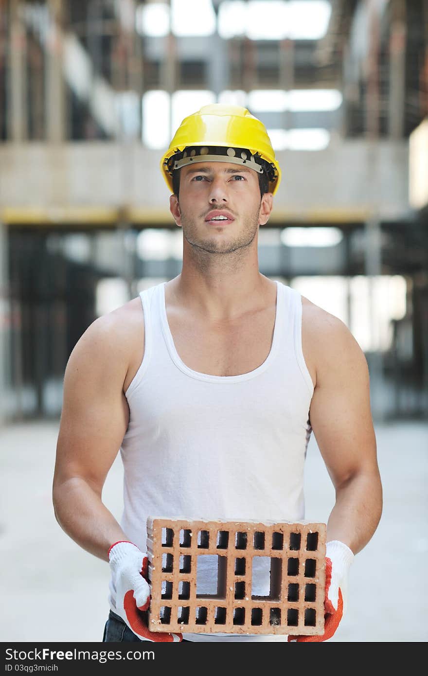 Handsome hard worker people portrait at concstruction site. Handsome hard worker people portrait at concstruction site