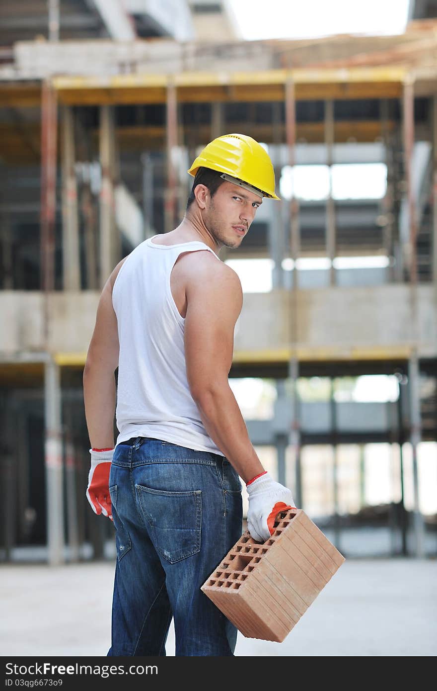 Handsome hard worker people portrait at concstruction site. Handsome hard worker people portrait at concstruction site