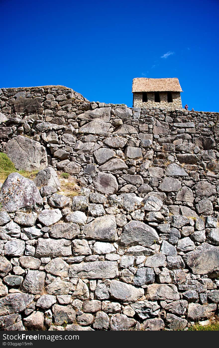 An Inca stone house in the ancient ruin Machu Picchu, Peru.