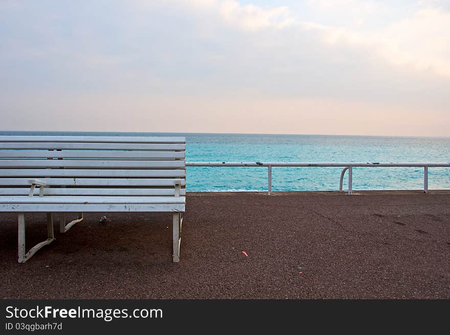 Bench in the promenade of coastal Nice, France.