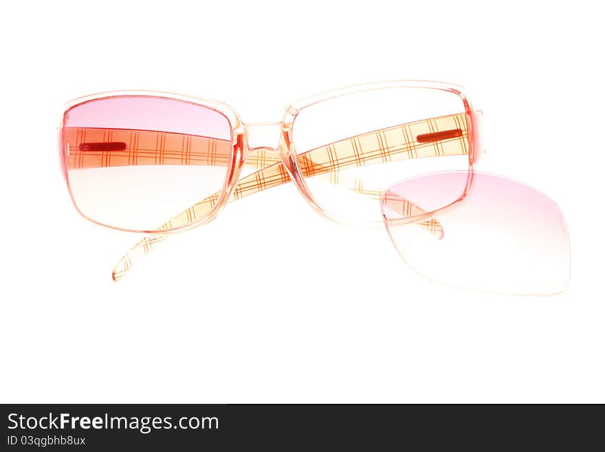 Red broken eyeglasses isolated on white background