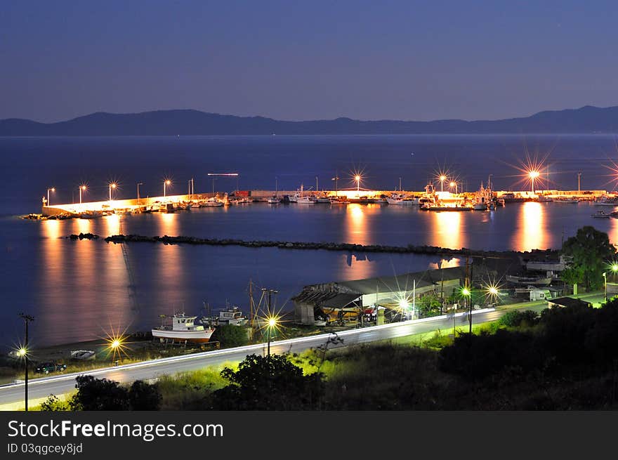 Night scene on the quay in the village Ierissos. Night scene on the quay in the village Ierissos