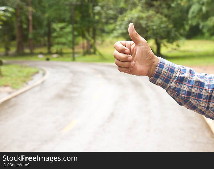 Hand Of Hiker Man At Rural