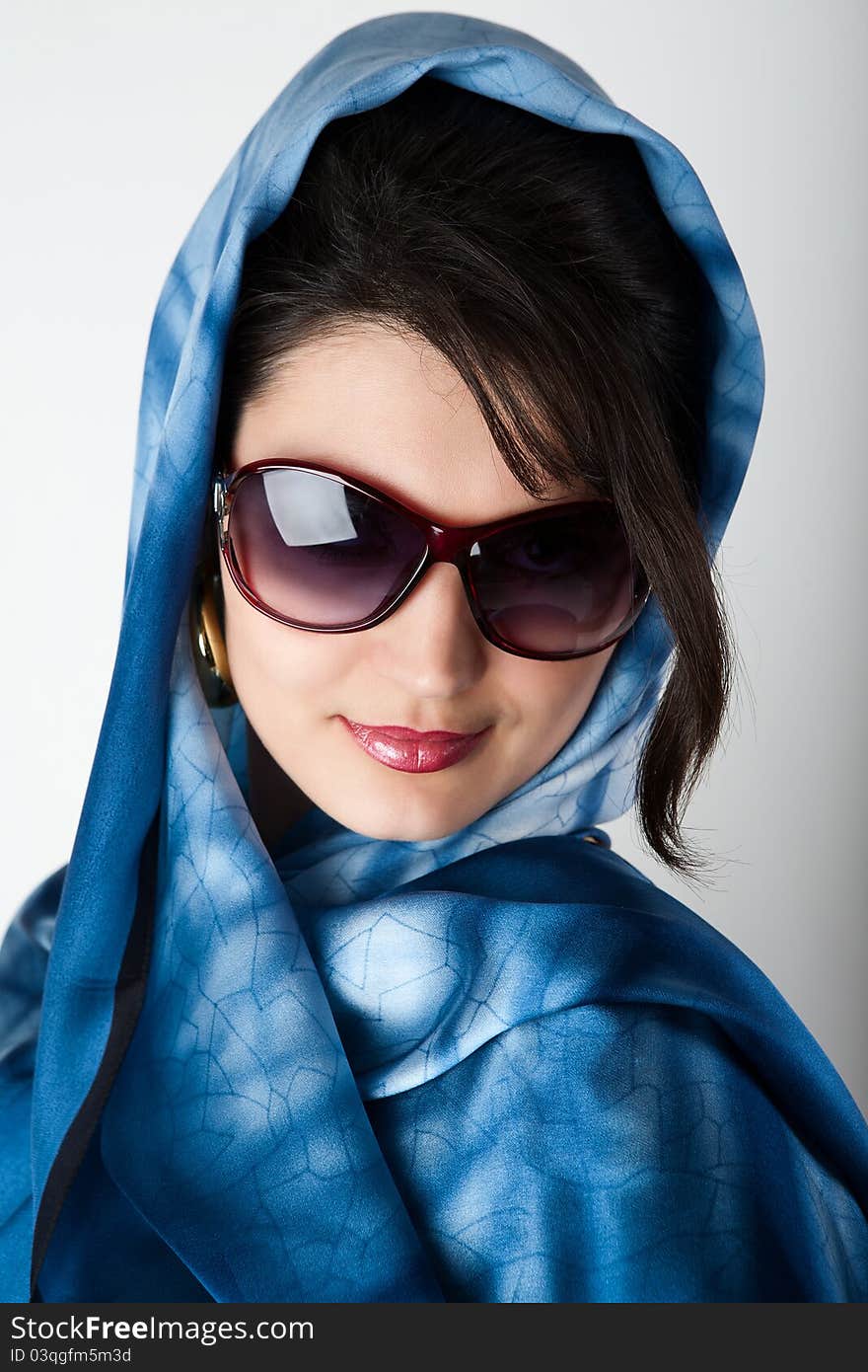 Portrait of young woman in big sunglasses. Portrait of young woman in big sunglasses.