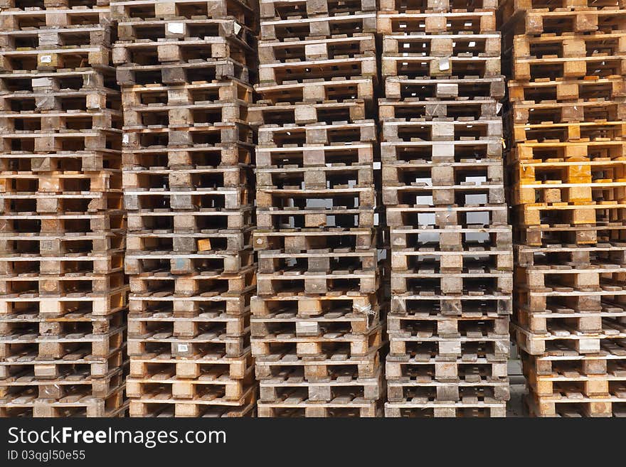 Used wooden euro pallets stacked. Used wooden euro pallets stacked