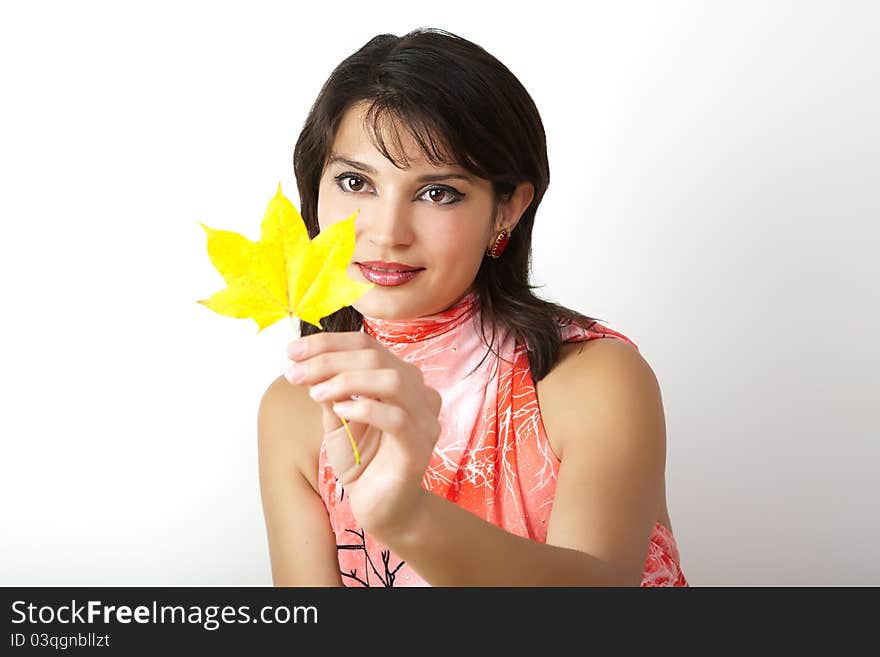 Studio Portrait Of Autumn Woman.