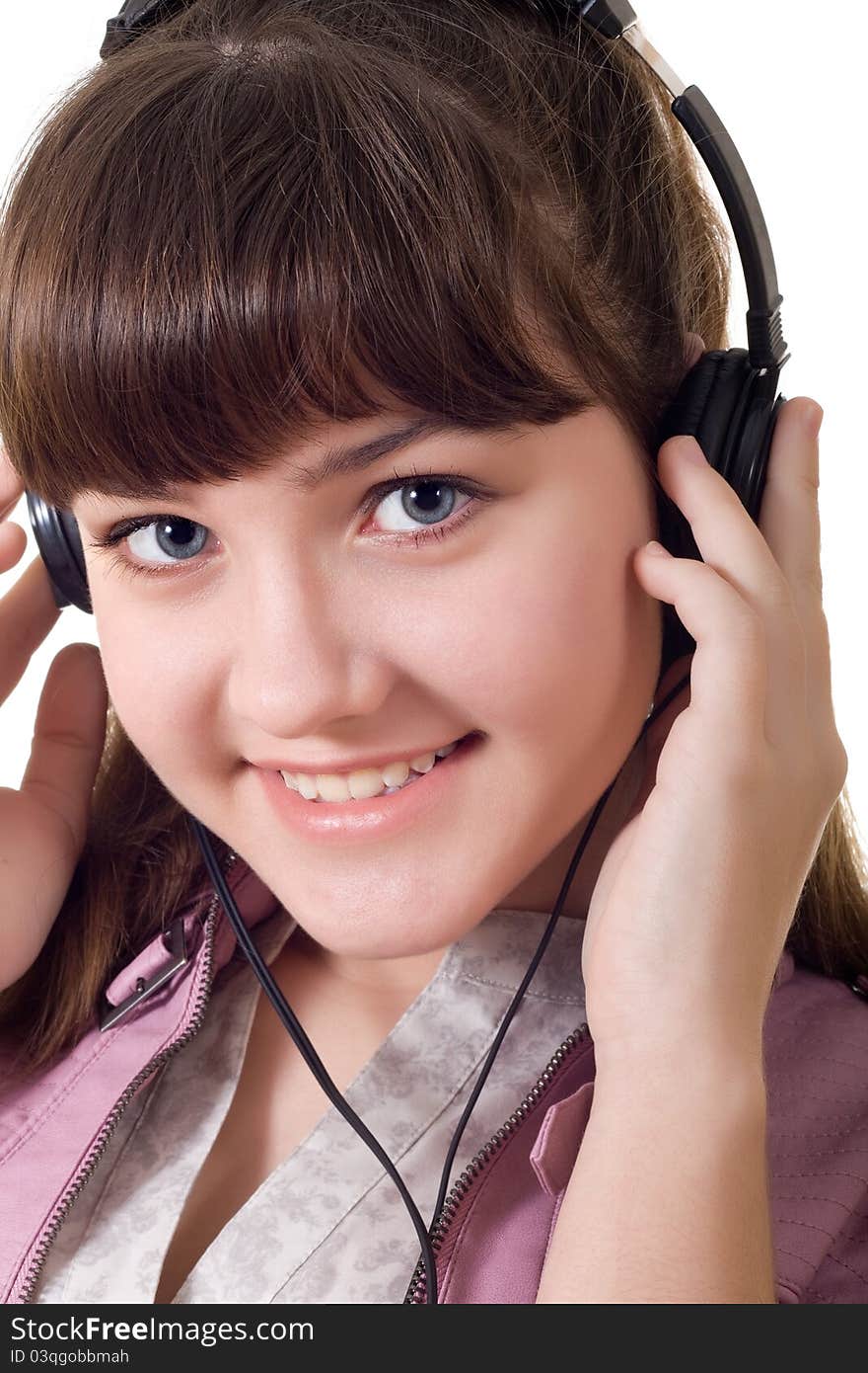 Closeup portrait of attractive girl with headphones