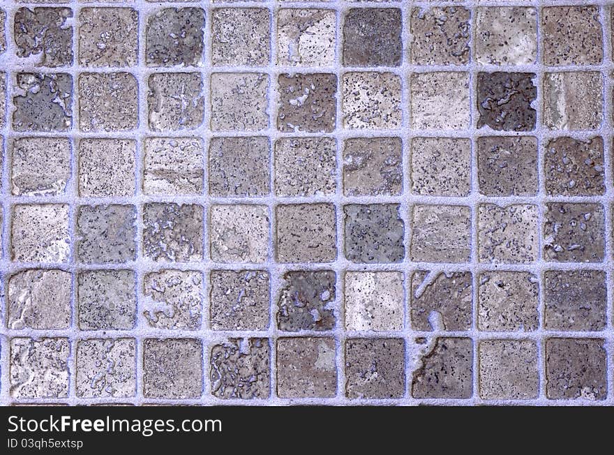 Closeup of a floor made with diferrent little square rocks. Closeup of a floor made with diferrent little square rocks