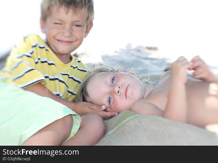 Brother and sister partly isolated over white