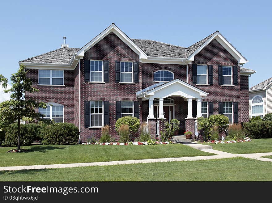 Brick home with arched entry