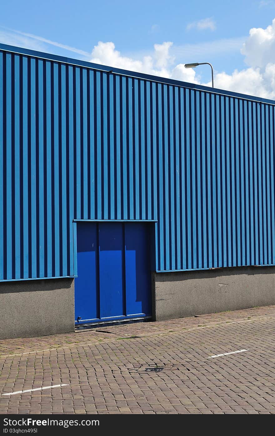 Blue storage gate and empty place. Blue storage gate and empty place