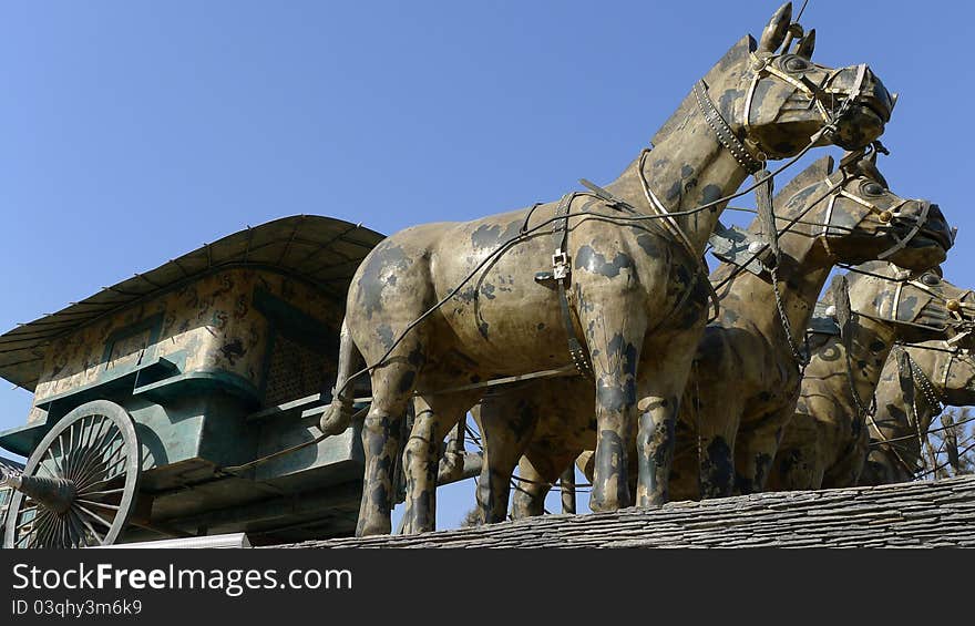 Painted bronze chariots and harness