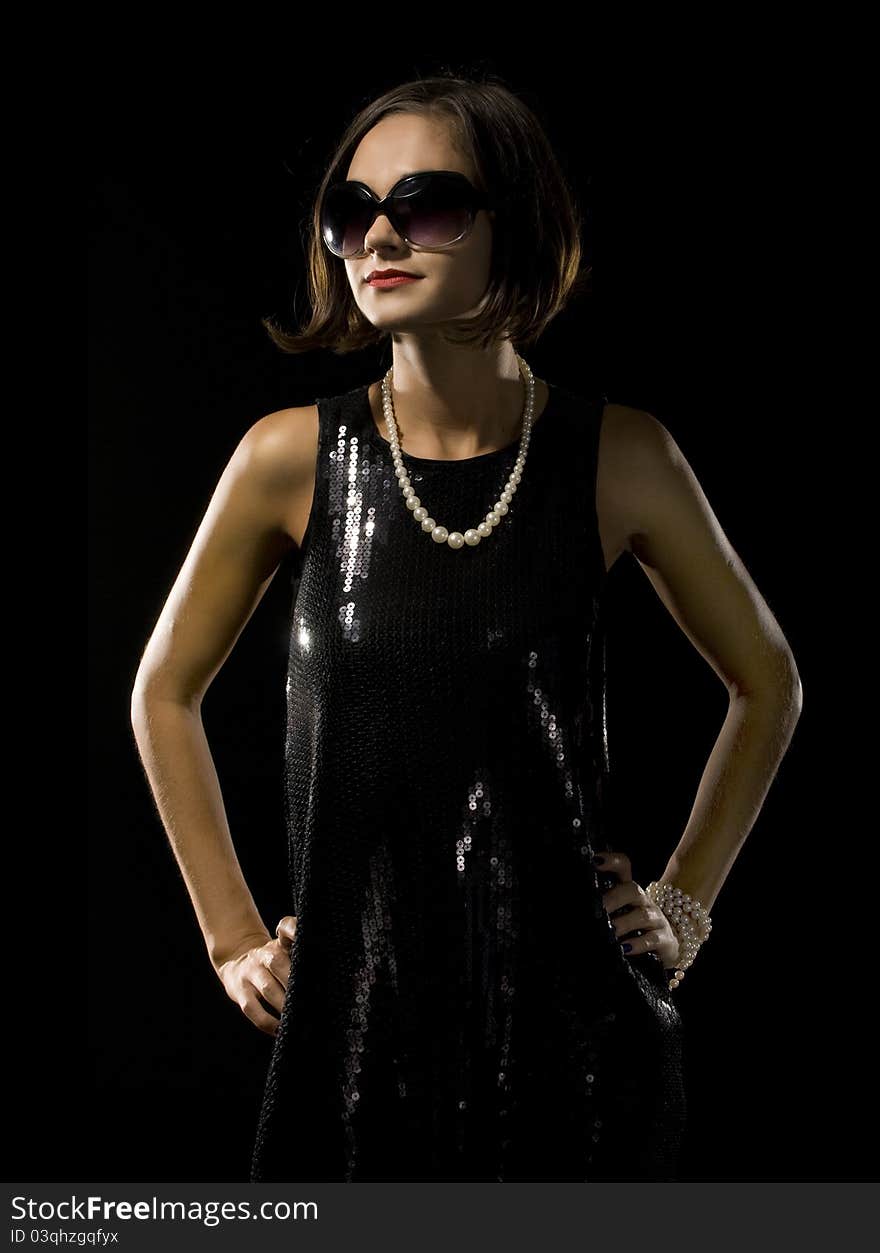 Studio portrait of girl in glasses