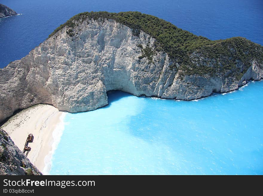 The smugglers cove on Zakynthos with the famous shipwreck. The most famous shipwreck in Europe annually attracts tourists to the Greek island of Zakynthos.