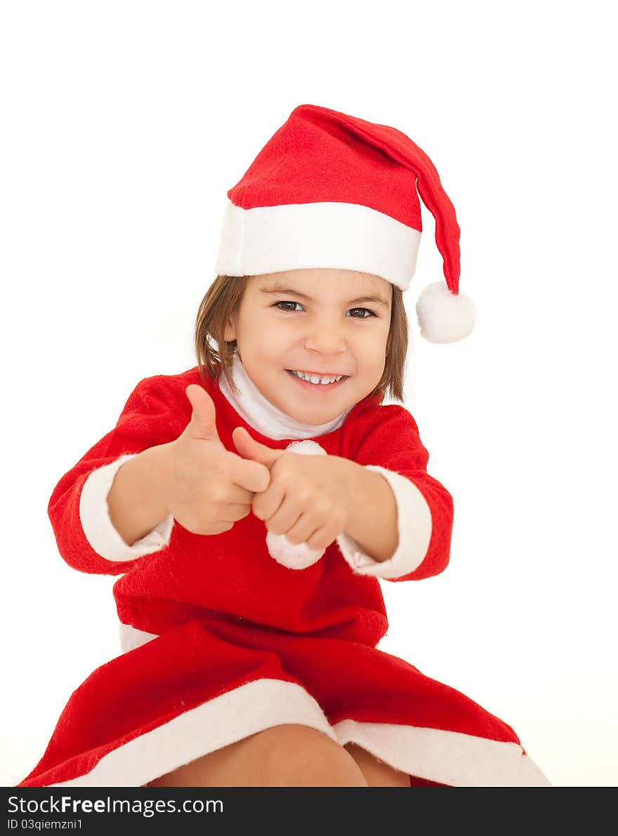 Little girl wearing santa clothes isolated on white