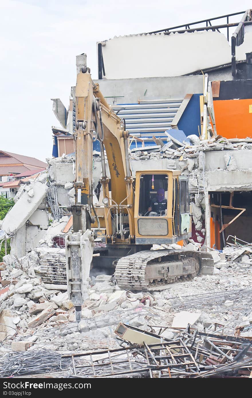 Bulldozer vehicle destroy old construction. Bulldozer vehicle destroy old construction