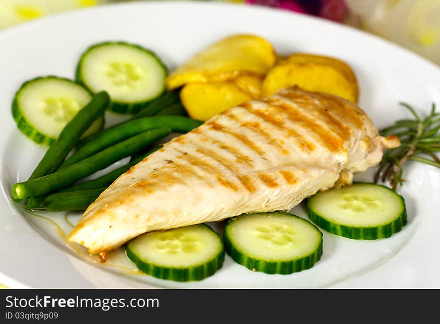 Stock Photo: grilled chicken breast with green bea