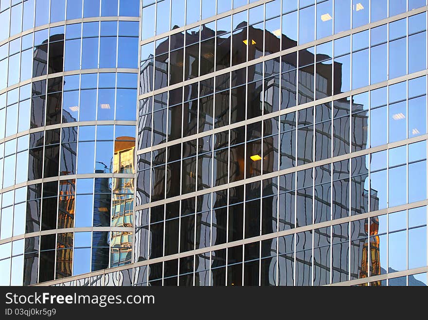 Window reflection from new city of modern technology in downtown Vancouver. Window reflection from new city of modern technology in downtown Vancouver