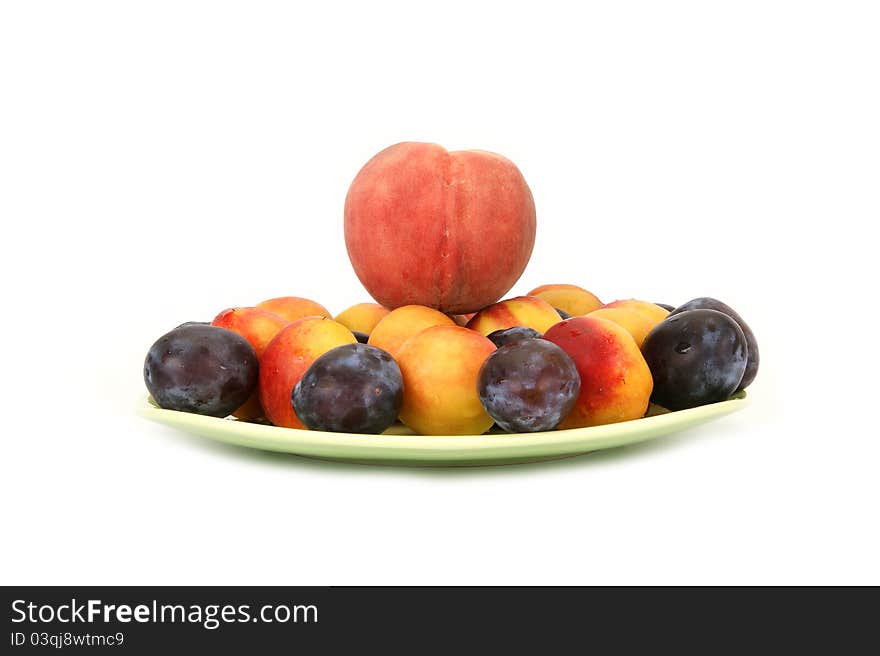 Natural ripe plums and peaches