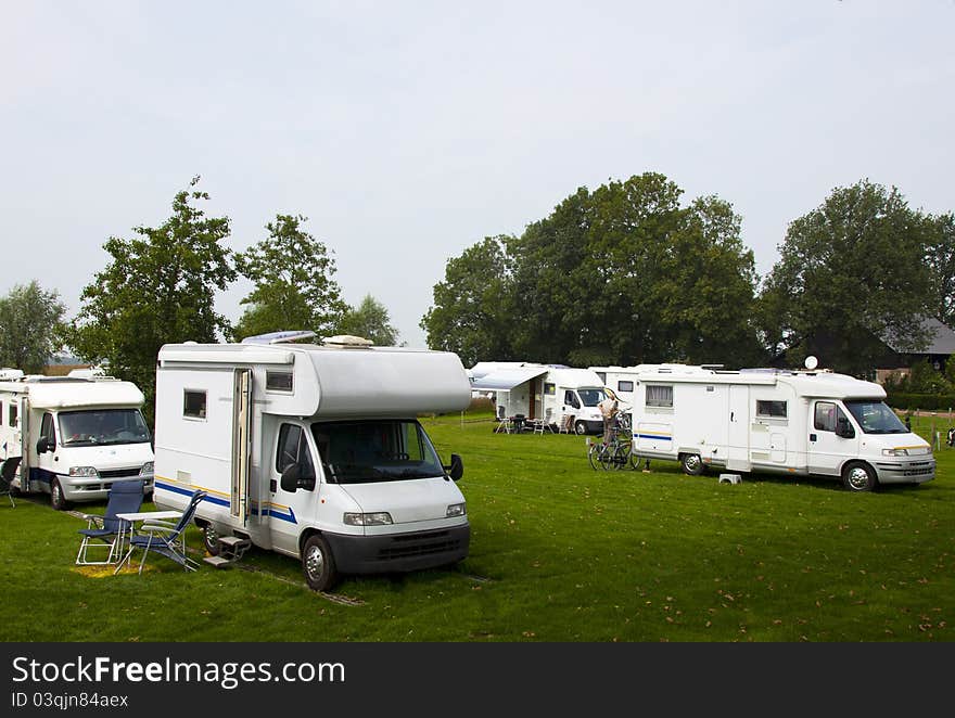 A camper in a dutch landscape