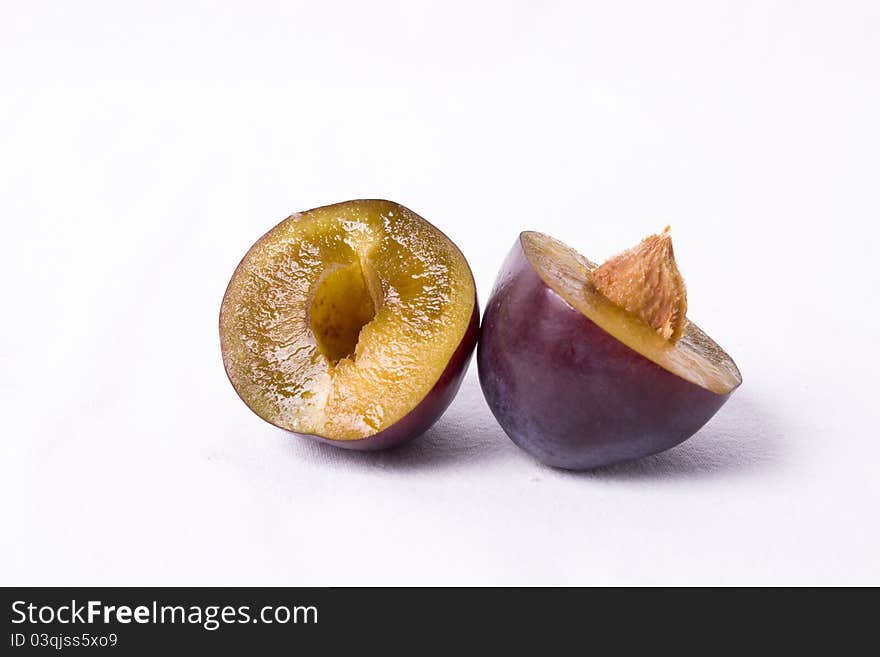 Plums isolated on white