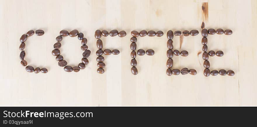 Picture of a the word COFFEE made of coffee beans