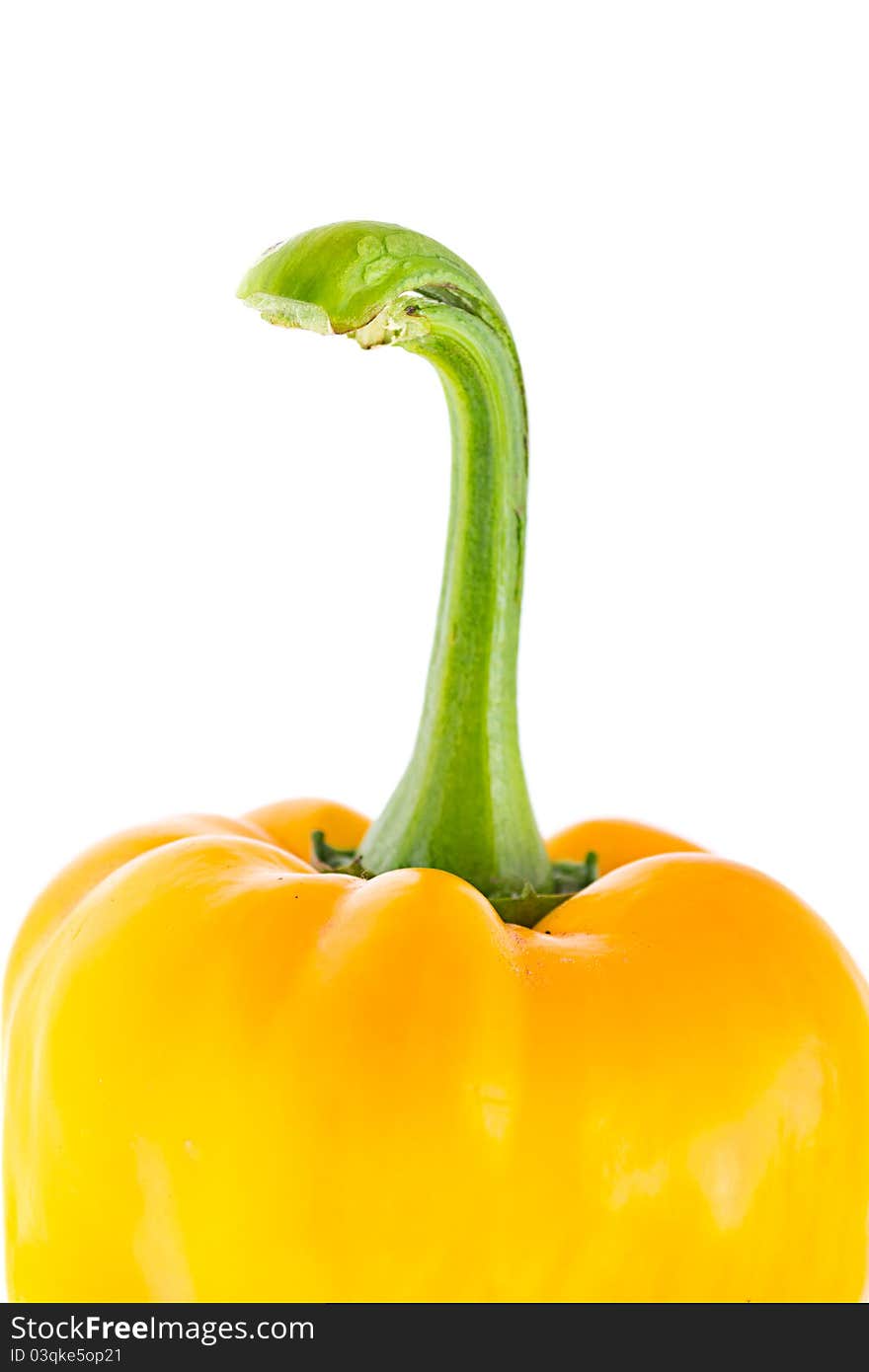 Yellow peppers on a white