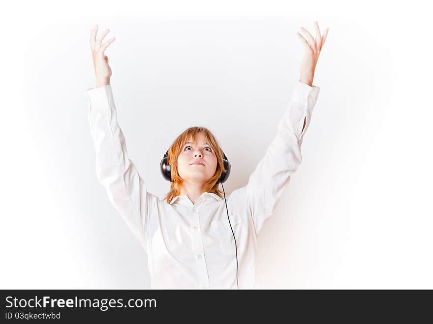 Blond girl in white wear looking up and hands-up overwhite. Blond girl in white wear looking up and hands-up overwhite