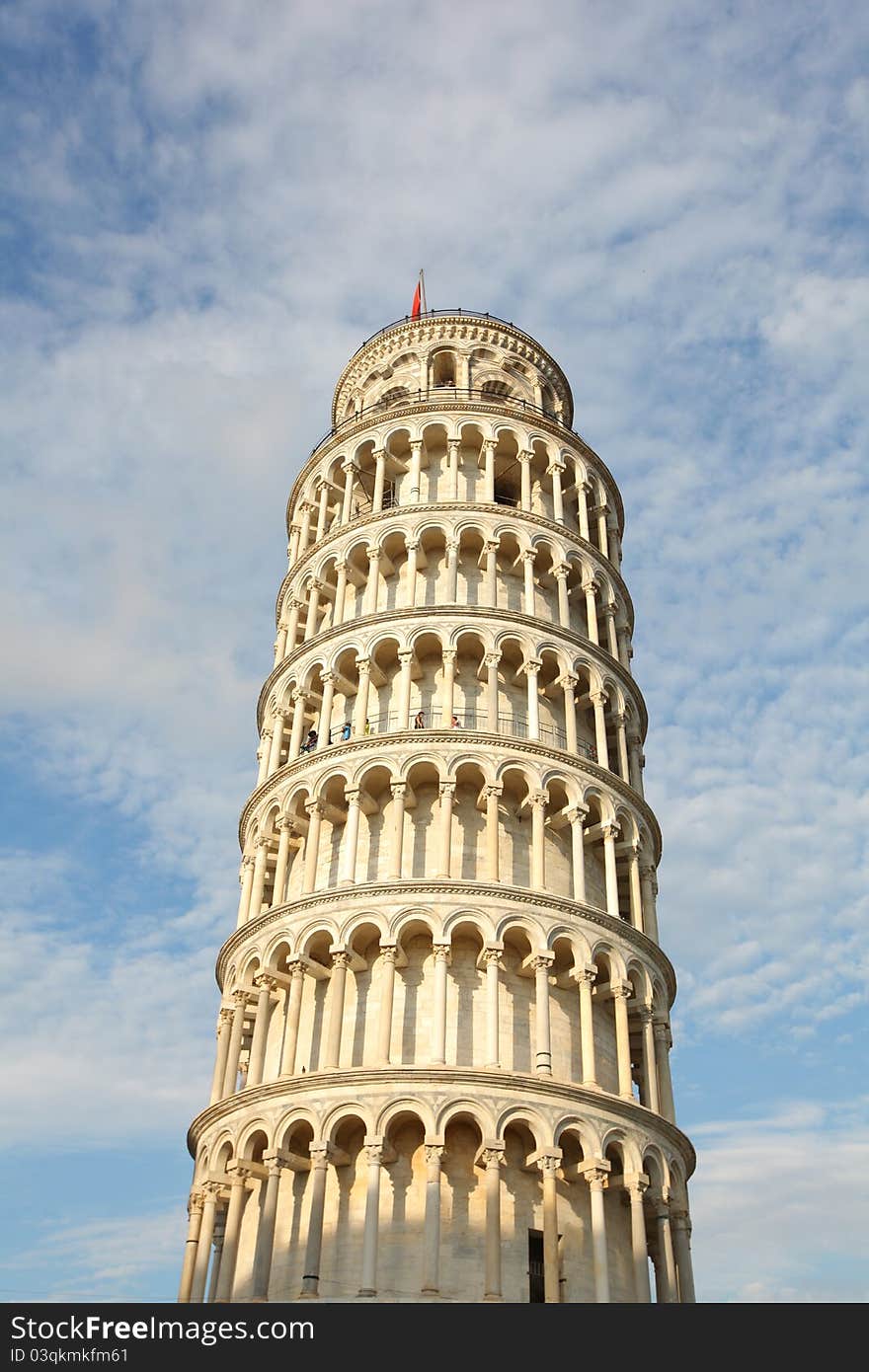 Reclining tower of Pisa from the ground looking up, with blue skies. Reclining tower of Pisa from the ground looking up, with blue skies.