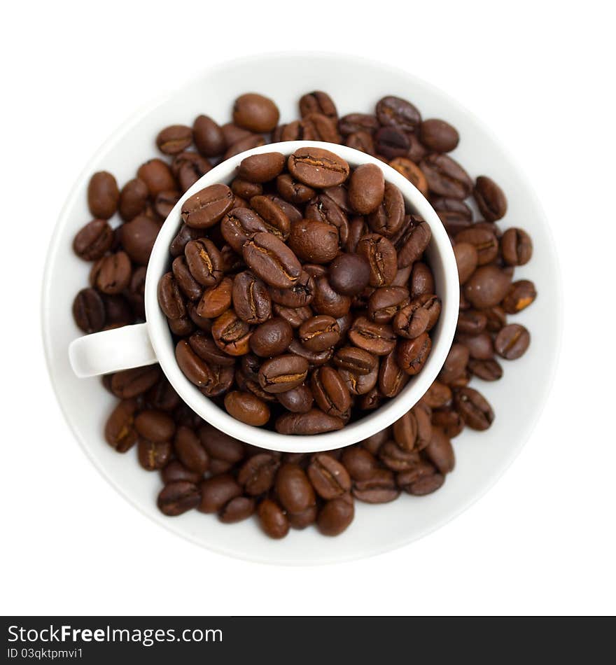 Coffee beans in a cup isolated on white