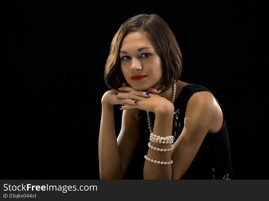 Beautiful young brunette studio portrait. Beautiful young brunette studio portrait