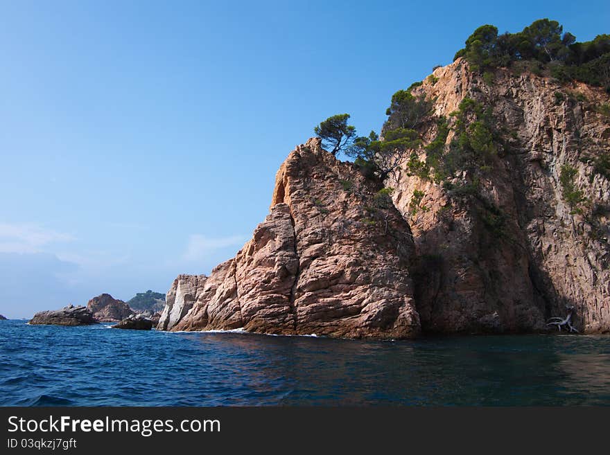 Summer seascape with waves and rocks, Costa Brava, Spain. August 2011. Summer seascape with waves and rocks, Costa Brava, Spain. August 2011.