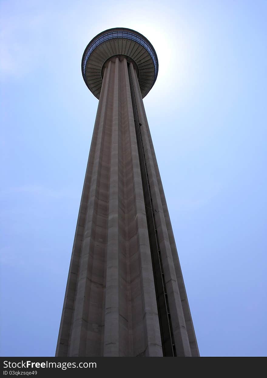 Upshot picture of a tower blocking the sun with blue sky. Upshot picture of a tower blocking the sun with blue sky.