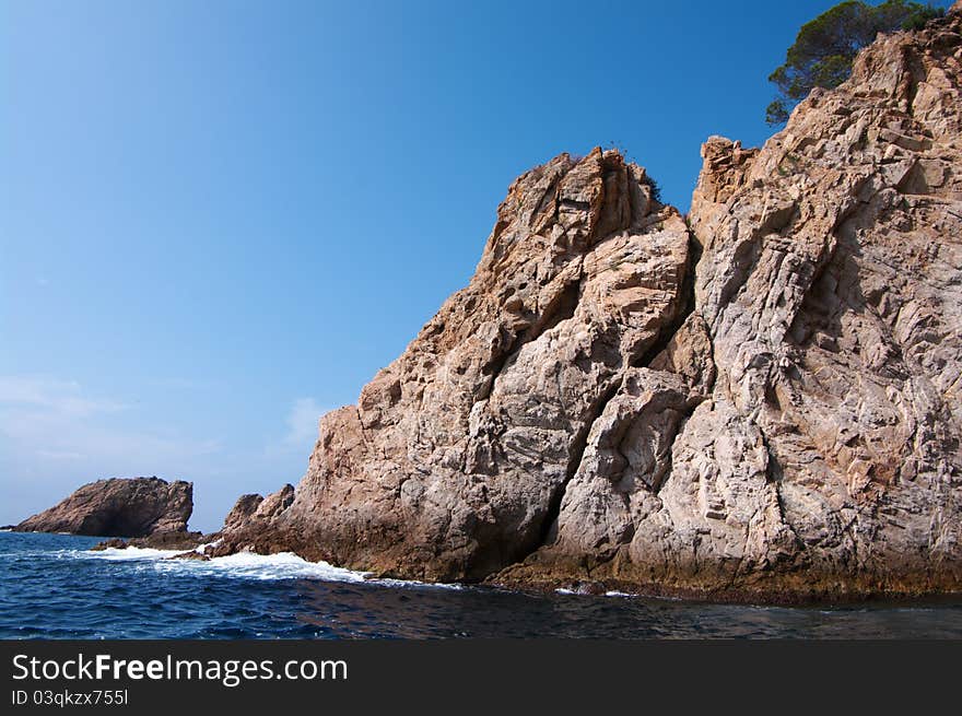 Summer seascape with waves and rocks, Costa Brava, Spain. August 2011. Summer seascape with waves and rocks, Costa Brava, Spain. August 2011.