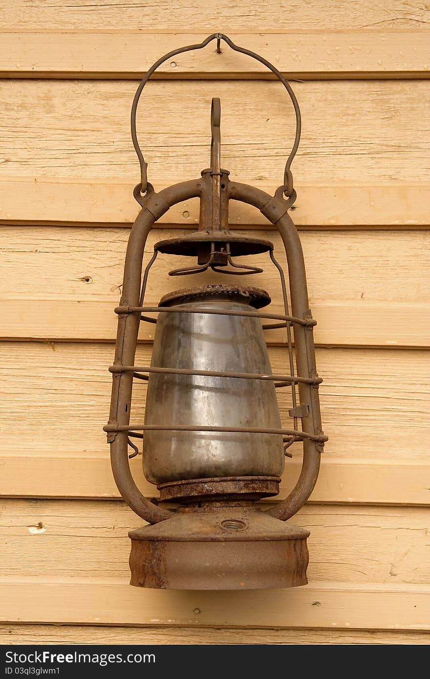 The old kerosene lamp hanging on the wall of a village house