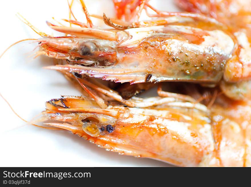 Fired shrimps on white background