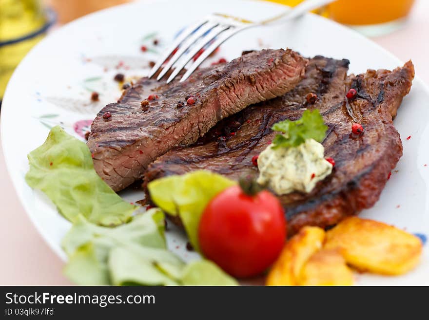 Grilled,New York Strip Steak with Vegetables.