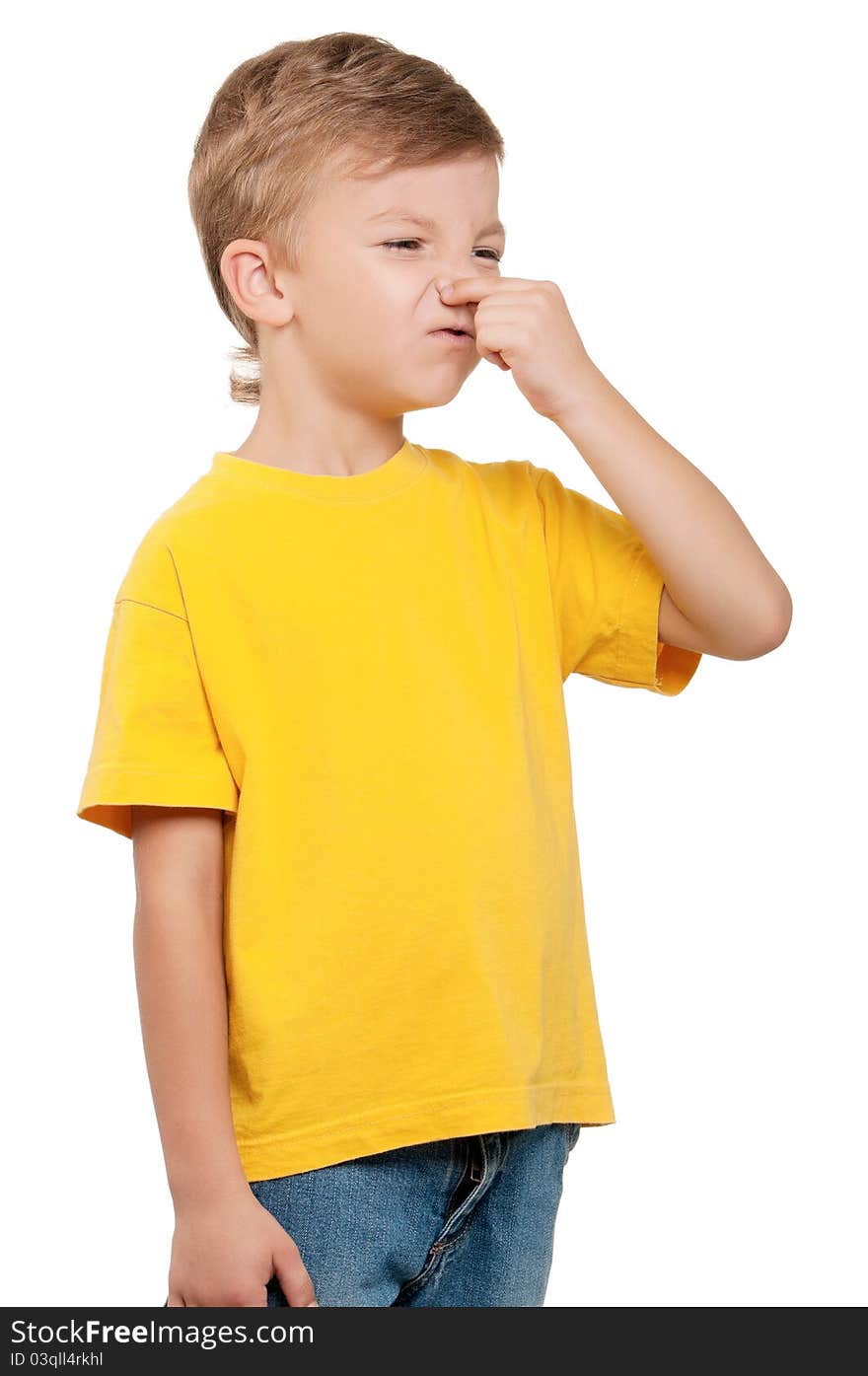 Portrait of little boy covering nose with hand on white background. Portrait of little boy covering nose with hand on white background