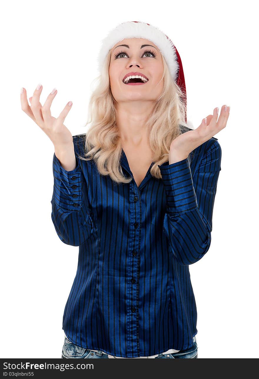 Portrait of a emotional beautiful christmas girl wearing Santa hat. Isolated on white background.