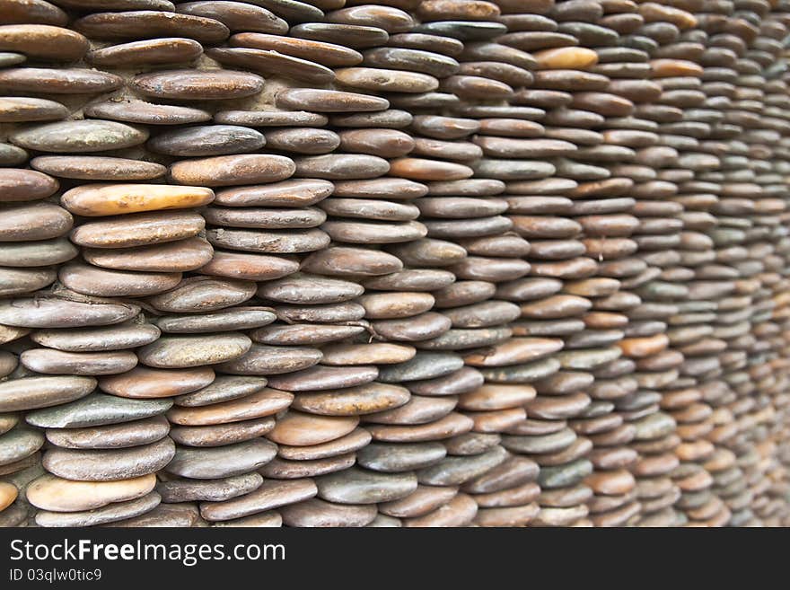 Circle pebble wall