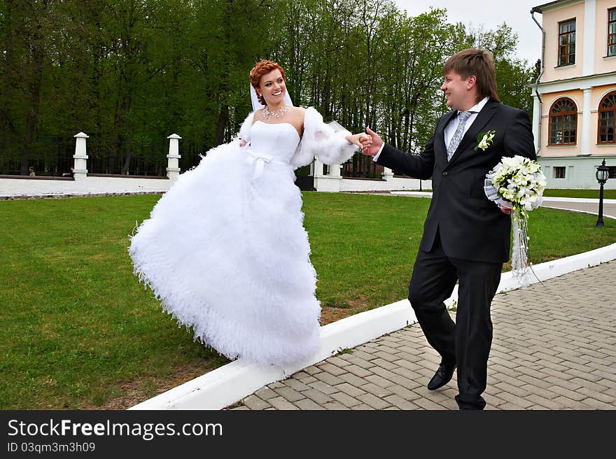 Happy Bride and groom at wedding walk