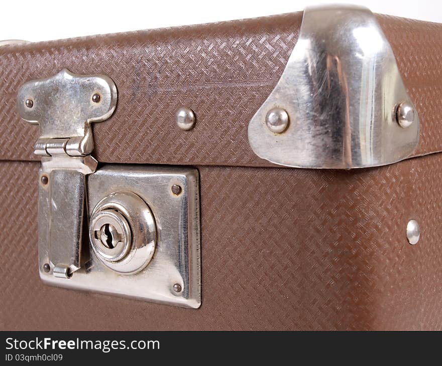 Color photo of an old suitcase and a book. Color photo of an old suitcase and a book