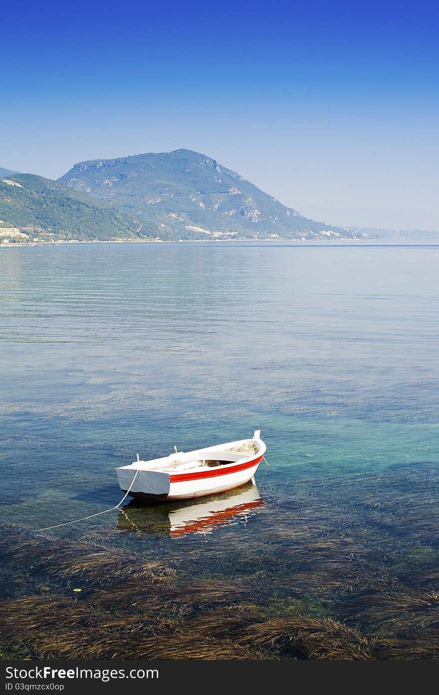 View across the sea to Moraitika, Corfu, Greece