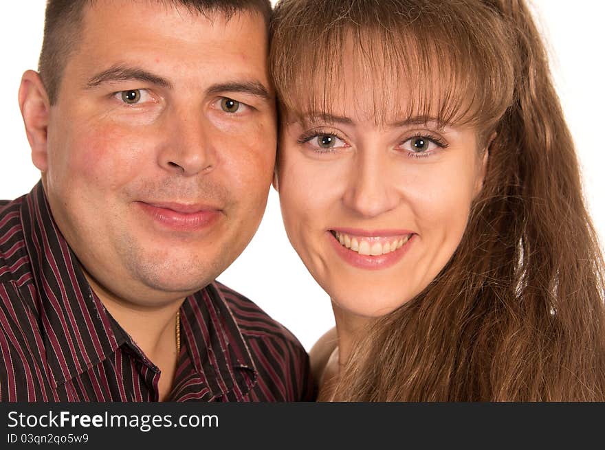 Portrait of an adult couple on a white. Portrait of an adult couple on a white