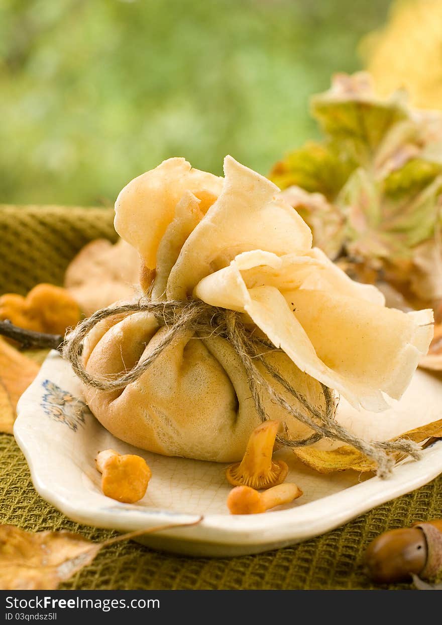 Pancake bag with mushrooms. Selective focus