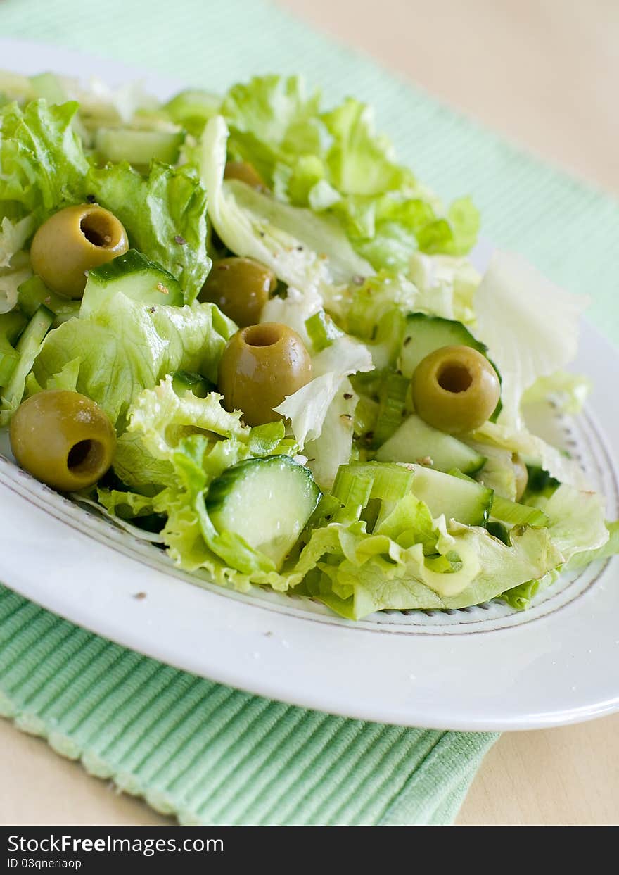 Fresh vegetable salad with olive. Selective focus