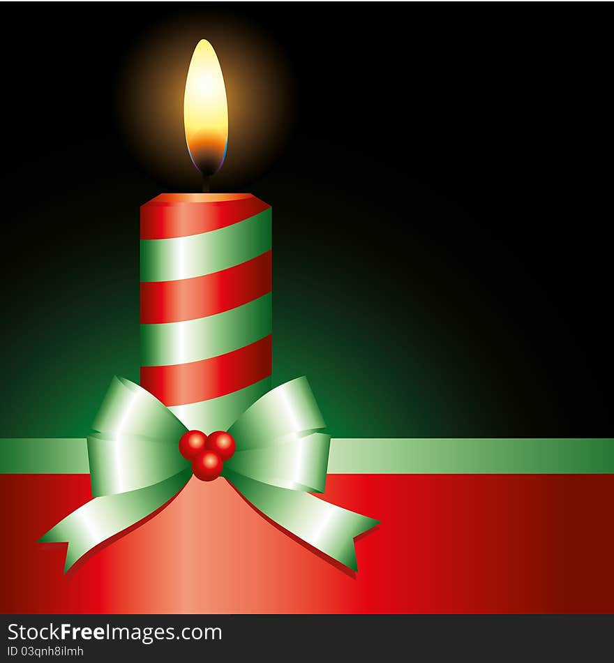 Red candle with green ribbon on black background