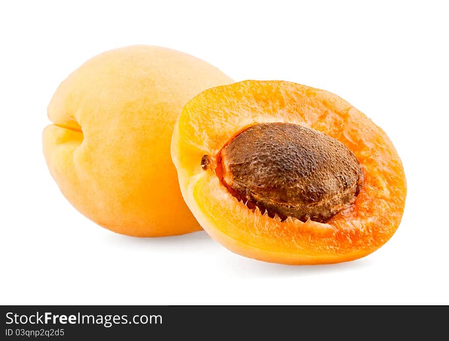 Apricot and half with bone on white background