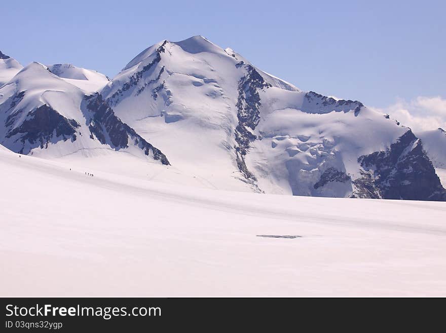 The snow covered mountain Breithorn seen from the Klein Mattehorn. The snow covered mountain Breithorn seen from the Klein Mattehorn.